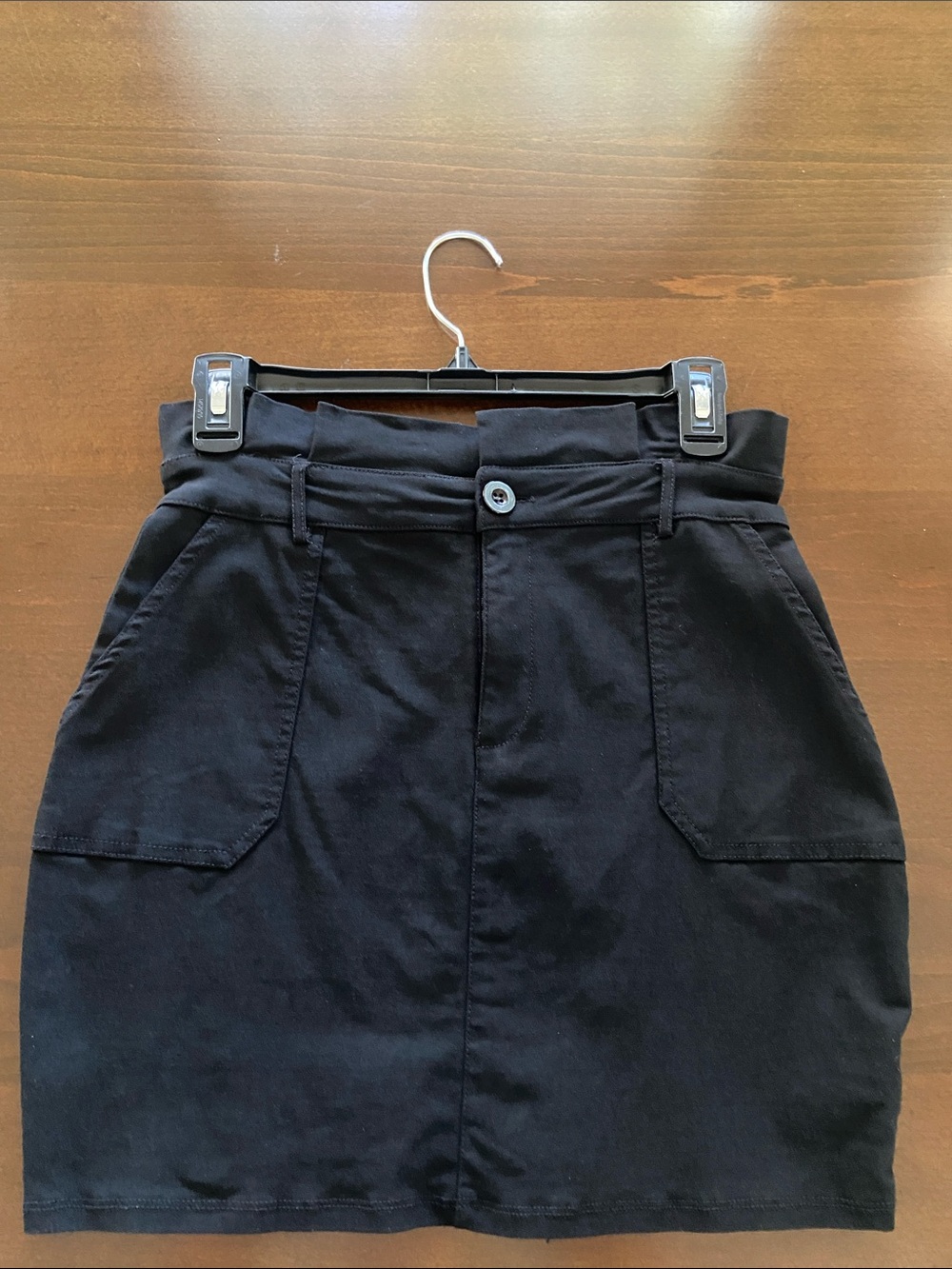 Black High-Rise Mini Skirt, size M, Chocolate brand.
